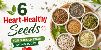 6 Heart-Healthy Seeds You Should Start Eating Today A variety of heart-healthy seeds including flaxseeds, chia seeds, pumpkin seeds, sesame seeds, sunflower seeds, and hemp seeds arranged around a heart symbol to promote cardiovascular health.